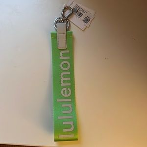 Lululemon green never lost keychain